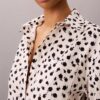 Camisa de lyocell con solapa enrollada y botones