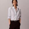 Camisa de lyocell con solapa enrollada y botones