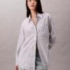 Camisa de popelín a rayas con botones y corte holgado Camisa de popelín a rayas con botones y corte holgado