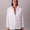 Camisa de popelín con botones y corte holgado