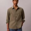 Camisa de popelín lavado con cuello de punta y corte holgado