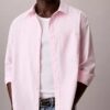 Camisa de popelín lavado con cuello de punta y corte holgado