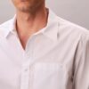 Camisa de popelín lavado con cuello de punta y corte holgado