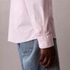 Camisa de popelín lavado con cuello de punta y corte holgado