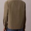 Camisa de popelín lavado con cuello de punta y corte holgado
