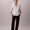 Camisa de popelín lavado con rayas teñidas en hilo Camisa de popelín lavado con rayas teñidas en hilo