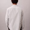 Camisa de popelín lavado con rayas teñidas en hilo Camisa de popelín lavado con rayas teñidas en hilo