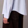 Camisa de popelín lavado con rayas teñidas en hilo Camisa de popelín lavado con rayas teñidas en hilo