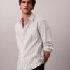 Camisa de popelín lavado con rayas teñidas en hilo Camisa de popelín lavado con rayas teñidas en hilo