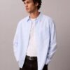 Camisa de popelín lavado con rayas teñidas en hilo Camisa de popelín lavado con rayas teñidas en hilo