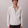 Camisa de popelín lavado con rayas teñidas en hilo Camisa de popelín lavado con rayas teñidas en hilo