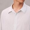 Camisa de rayas con botones, confeccionada en mezcla de viscosa y corte holgado