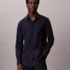 Camisa entallada elástica con botones Camisa entallada elástica con botones