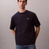 Camiseta de cuello redondo holgada con logotipo de archivo Camiseta de cuello redondo holgada con logotipo de archivo