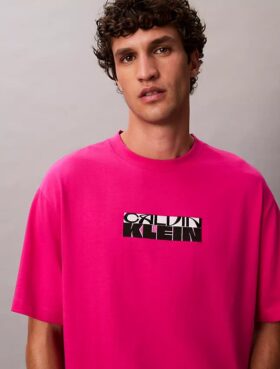 Camiseta holgada con gráfico de logotipo en bloque