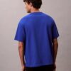 Camiseta holgada con gráfico de logotipo en bloque