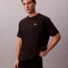 Camiseta holgada con gráfico del logotipo en piqué refrescante Camiseta holgada con gráfico del logotipo en piqué refrescante