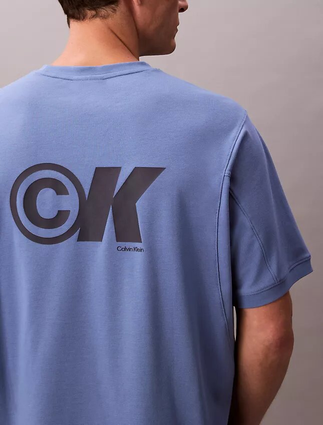 Camiseta holgada con gráfico del logotipo en piqué refrescante Camiseta holgada con gráfico del logotipo en piqué refrescante