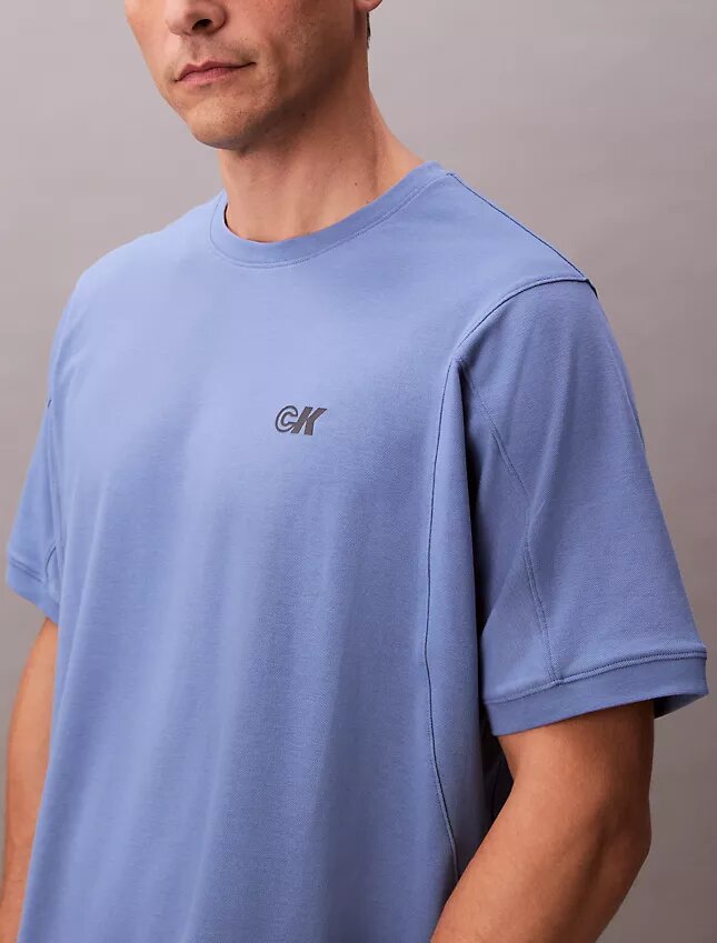 Camiseta holgada con gráfico del logotipo en piqué refrescante Camiseta holgada con gráfico del logotipo en piqué refrescante