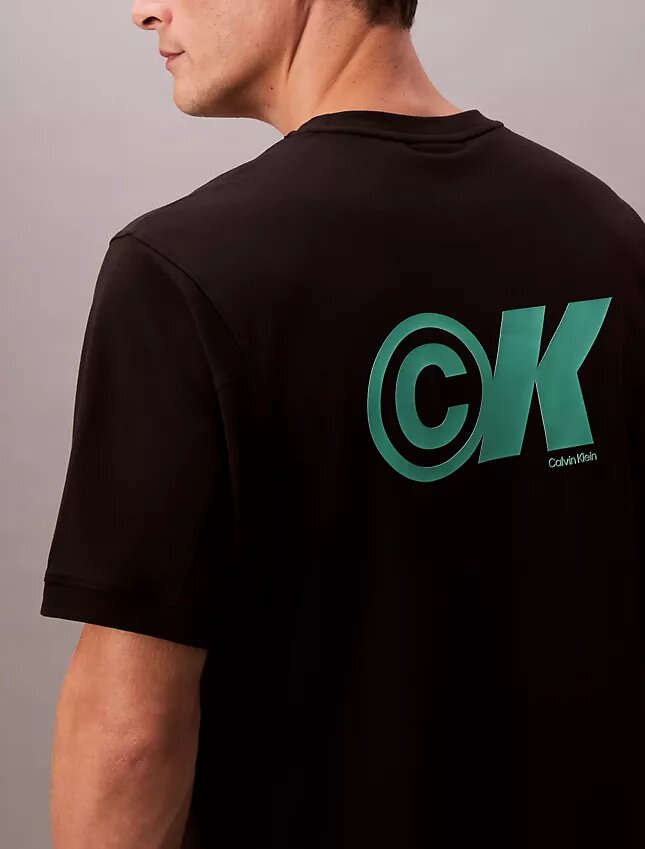 Camiseta holgada con gráfico del logotipo en piqué refrescante Camiseta holgada con gráfico del logotipo en piqué refrescante