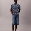 Camiseta holgada con logotipo de rayas