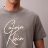 Camiseta holgada con logotipo en letra cursiva Camiseta holgada con logotipo en letra cursiva