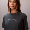 Camiseta holgada con logotipo en letra cursiva Camiseta holgada con logotipo en letra cursiva