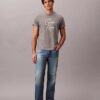 Camiseta holgada con logotipo en letra cursiva Camiseta holgada con logotipo en letra cursiva