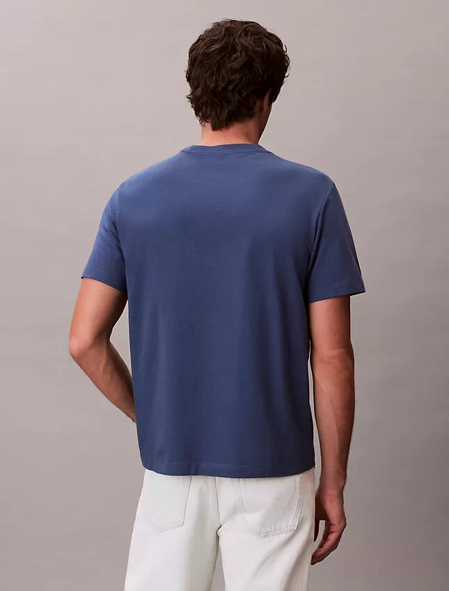 Camiseta holgada con logotipo en letra cursiva Camiseta holgada con logotipo en letra cursiva