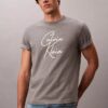 Camiseta holgada con logotipo en letra cursiva Camiseta holgada con logotipo en letra cursiva