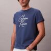Camiseta holgada con logotipo en letra cursiva Camiseta holgada con logotipo en letra cursiva