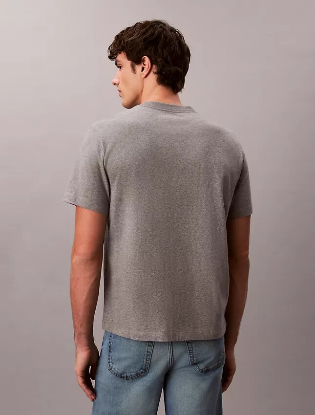 Camiseta holgada con logotipo en letra cursiva Camiseta holgada con logotipo en letra cursiva