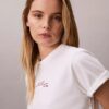 Camiseta holgada con logotipo en letra cursiva Camiseta holgada con logotipo en letra cursiva
