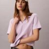 Camiseta polo de algodón con ribete contorneado