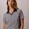 Camiseta polo de algodón con ribete contorneado Camiseta polo de algodón con ribete contorneado