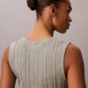 Camiseta sin mangas de algodón liso con cuello acanalado y botones Camiseta sin mangas de algodón liso con cuello acanalado y botones