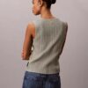 Camiseta sin mangas de algodón liso con cuello acanalado y botones Camiseta sin mangas de algodón liso con cuello acanalado y botones