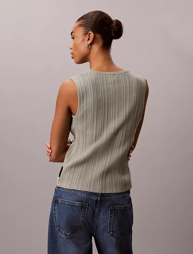 Camiseta sin mangas de algodón liso con cuello acanalado y botones Camiseta sin mangas de algodón liso con cuello acanalado y botones