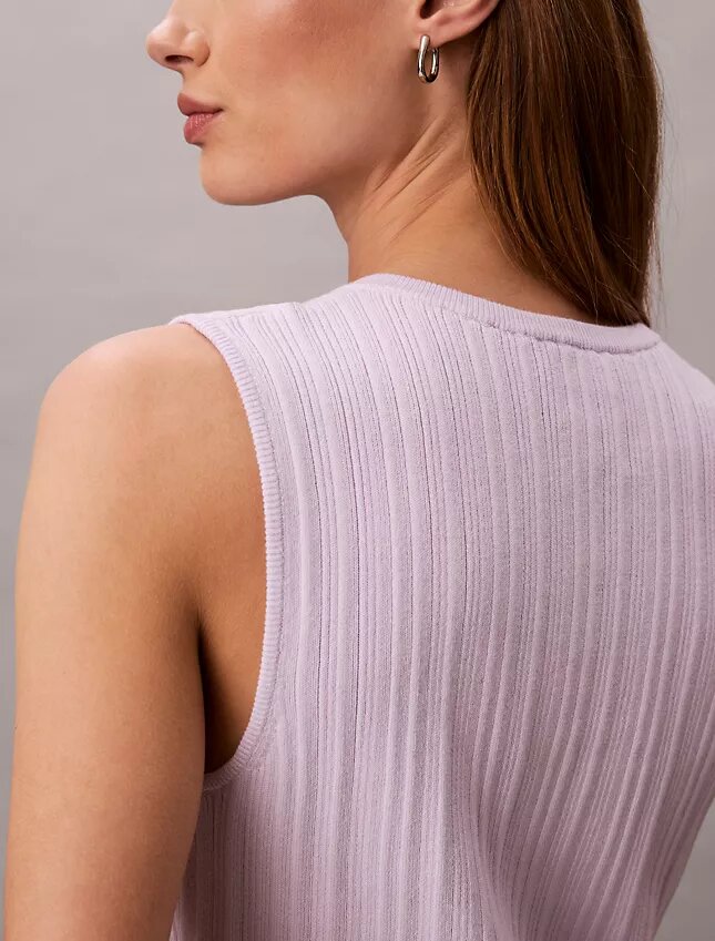 Camiseta sin mangas de algodón liso con cuello acanalado y botones Camiseta sin mangas de algodón liso con cuello acanalado y botones