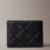 Cartera de tres pliegues con logotipo en relieve Cartera de tres pliegues con logotipo en relieve