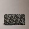 Cartera larga con cremallera y Monogram integral Cartera larga con cremallera y Monogram integral