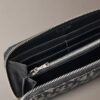Cartera larga con cremallera y Monogram integral Cartera larga con cremallera y Monogram integral