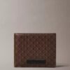 Cartera plegable con el logotipo del emblema por toda la superficie y compartimento para monedas