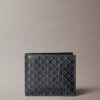 Cartera plegable con el logotipo del emblema por toda la superficie y compartimento para monedas