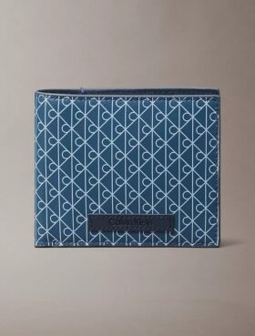 Cartera plegable con el logotipo del emblema por toda la superficie y compartimento para monedas