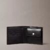 Cartera plegable con el logotipo del emblema por toda la superficie y compartimento para monedas