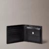 Cartera plegable con el logotipo del emblema por toda la superficie y compartimento para monedas