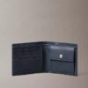 Cartera plegable con el logotipo del emblema por toda la superficie y compartimento para monedas