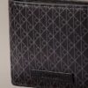 Cartera plegable con el logotipo del emblema por toda la superficie y compartimento para monedas