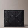Cartera plegable con logotipo en relieve y compartimento para monedas Cartera plegable con logotipo en relieve y compartimento para monedas